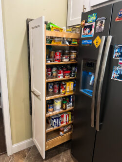 Pantry cabinet remodel with rollout storage shelves by Sablotny Floors in Jacksonville Illinois