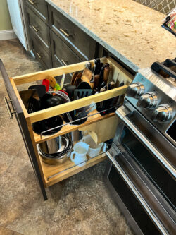 Kitchen pantry storage upgrades with pullout drawers installed by Sablotny Floors in Central Illinois